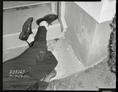 LAPD Fototeka: Shooting victim, occurred on 7th Ave in the Wilshire district, Los Angeles, 1950 